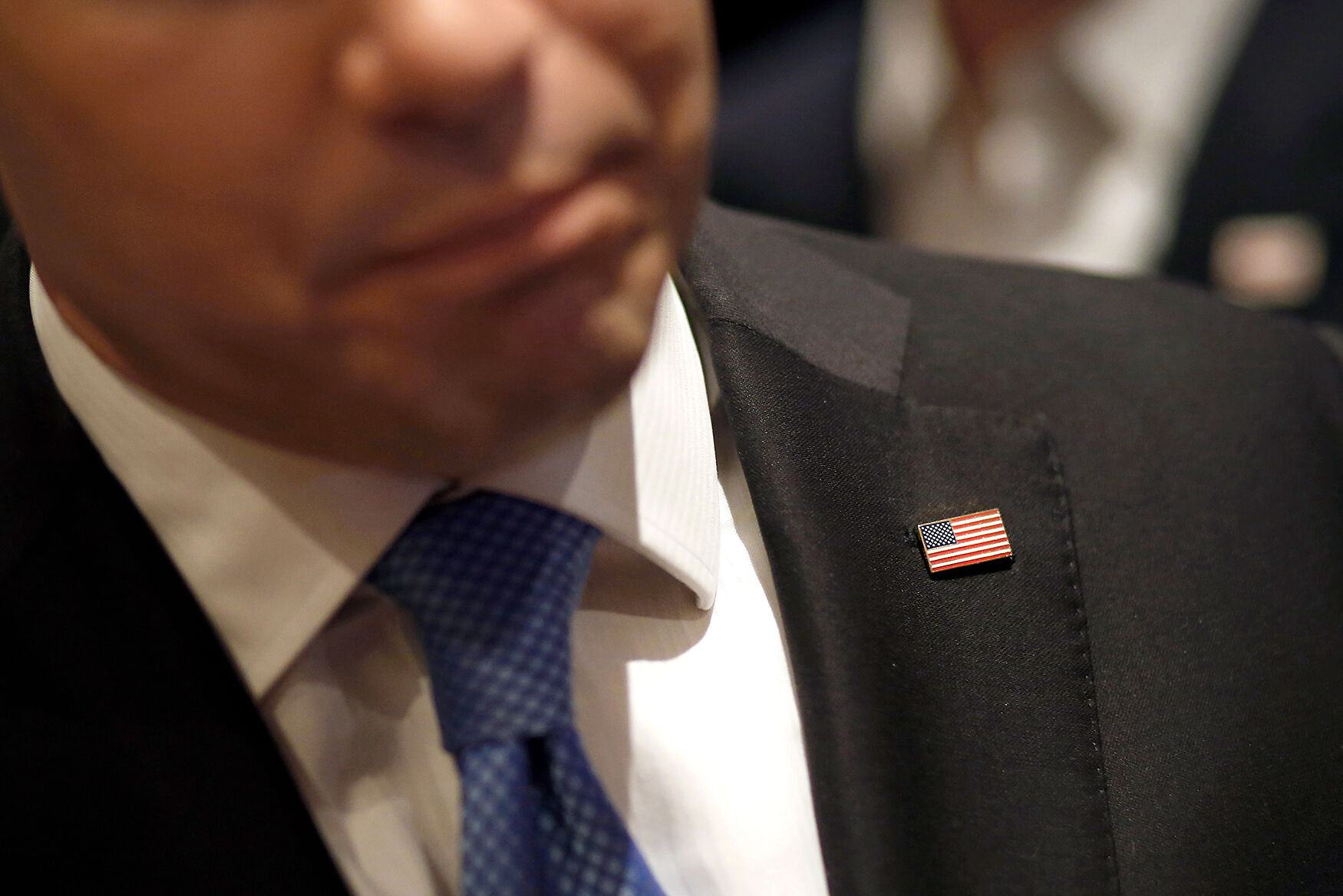 Republican presidential candidate, Sen. Marco Rubio, R-Fla. wears an American flag lapel pin